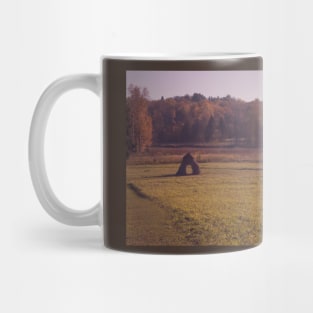 Autumn field with haystack and the wood Mug